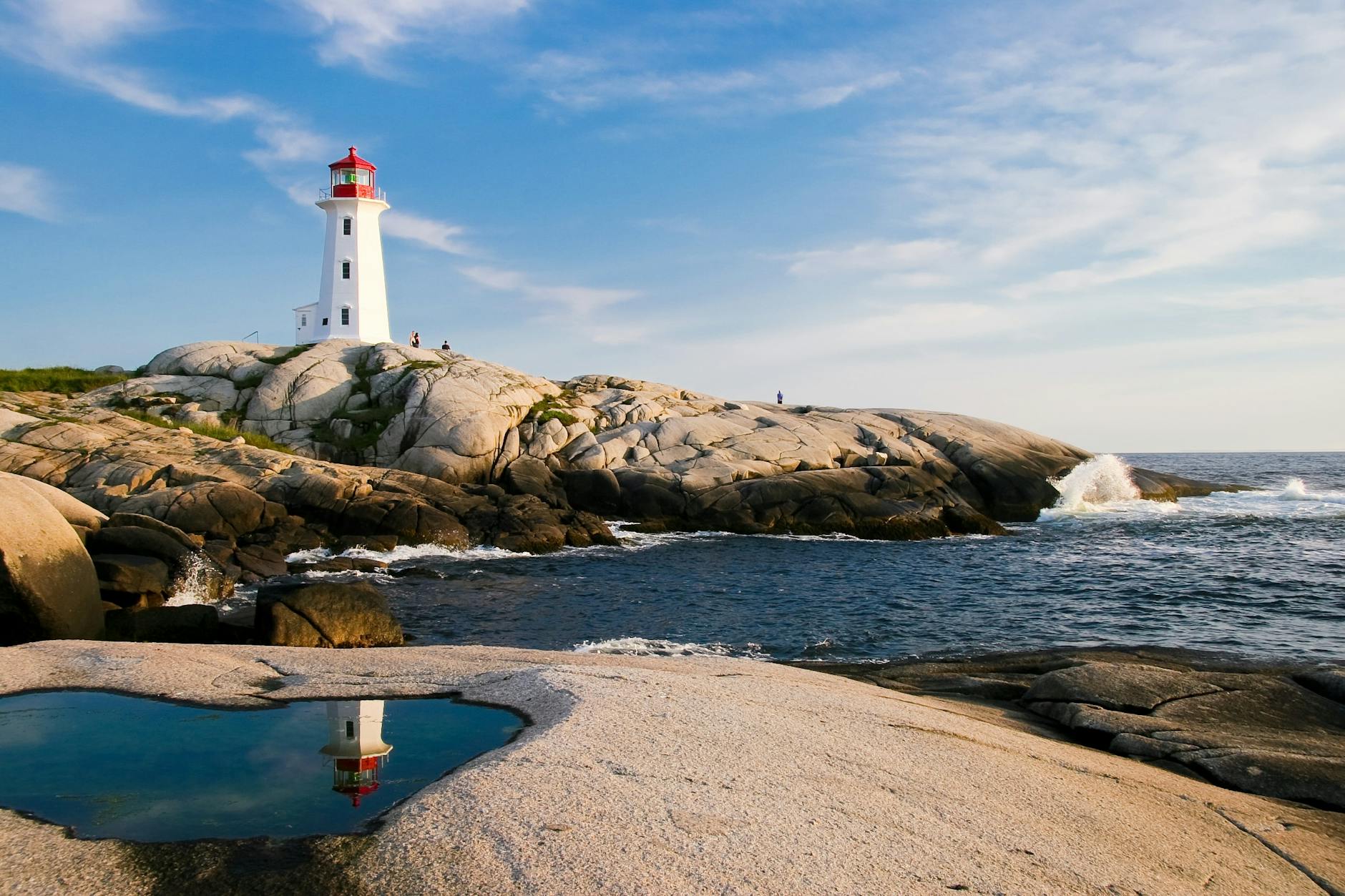 In this picture a lighthouse warns seafarers about the presence of rocks. These messages concern navigation hazards.