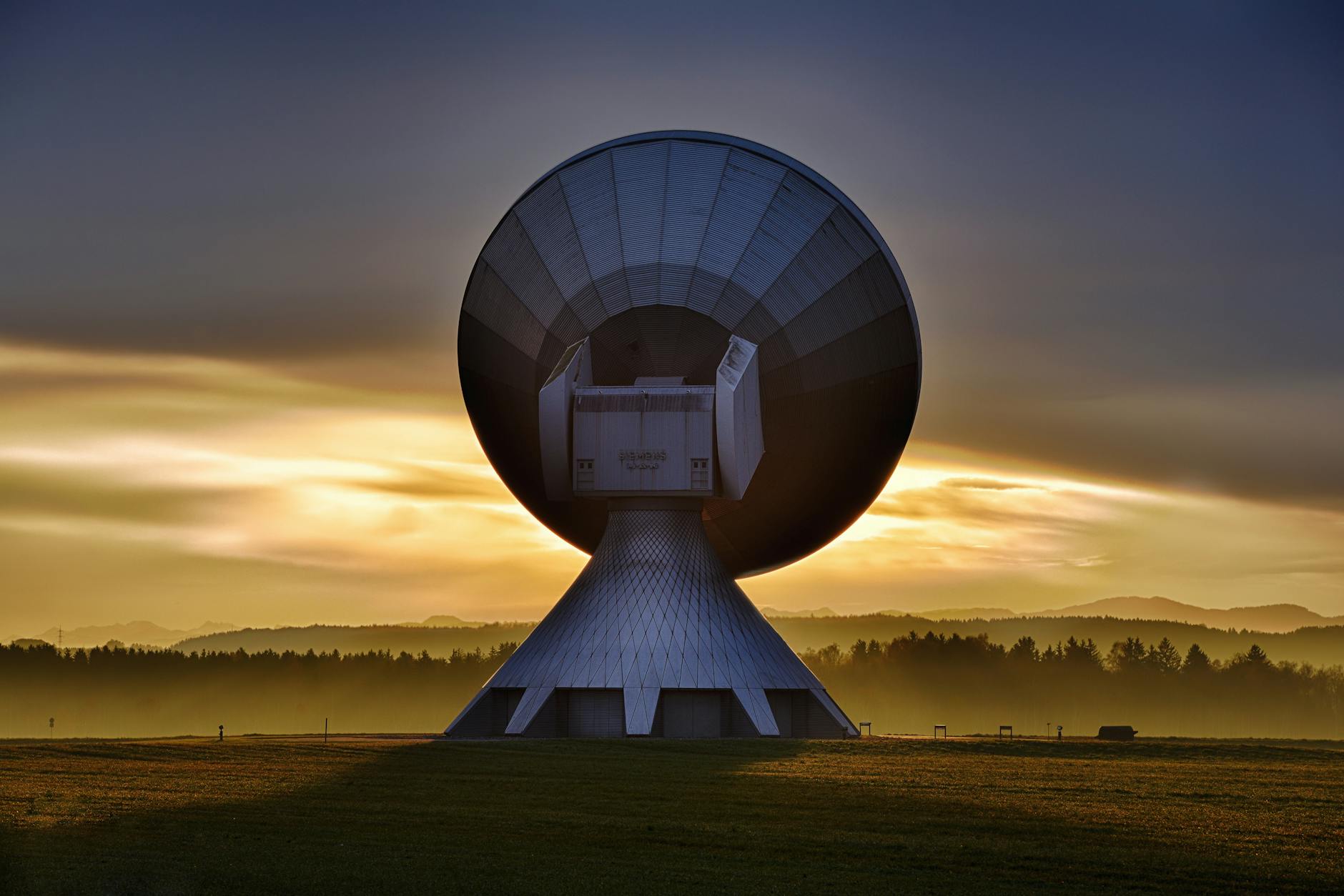 This photo of a satellite transmission station is intended to bring to mind the idea of safety messages being prepared on the ground, then broadcast to the satellites.